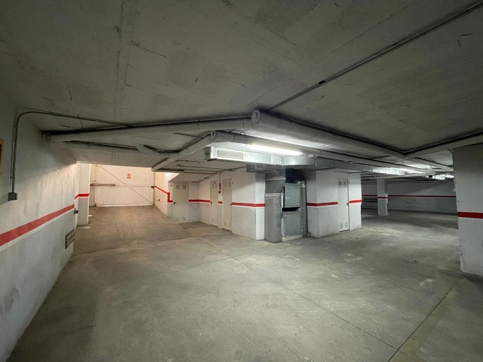 Parking space located on level -2, with comfortable access ramps.