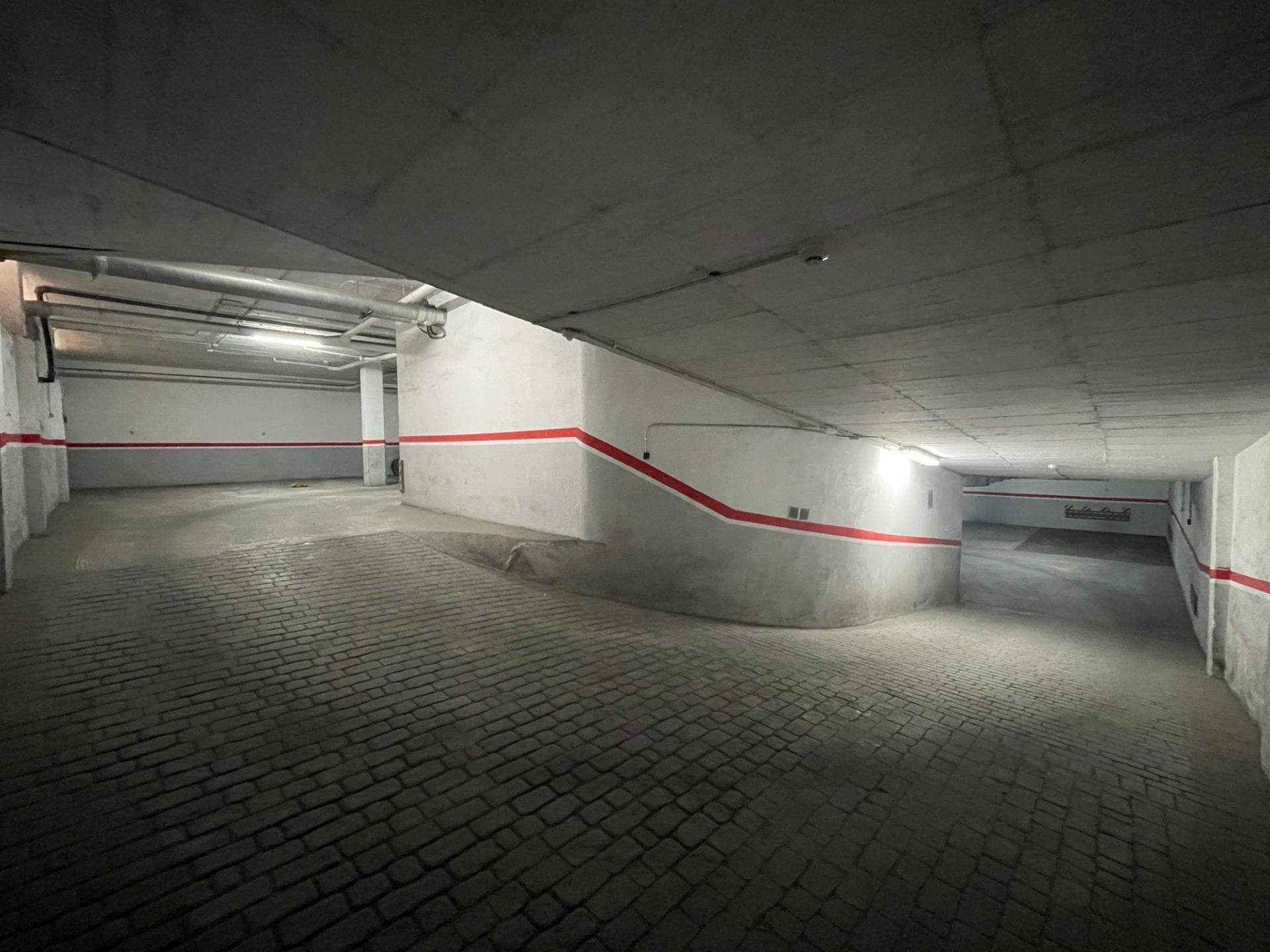 Parking space located on level -2, with comfortable access ramps.