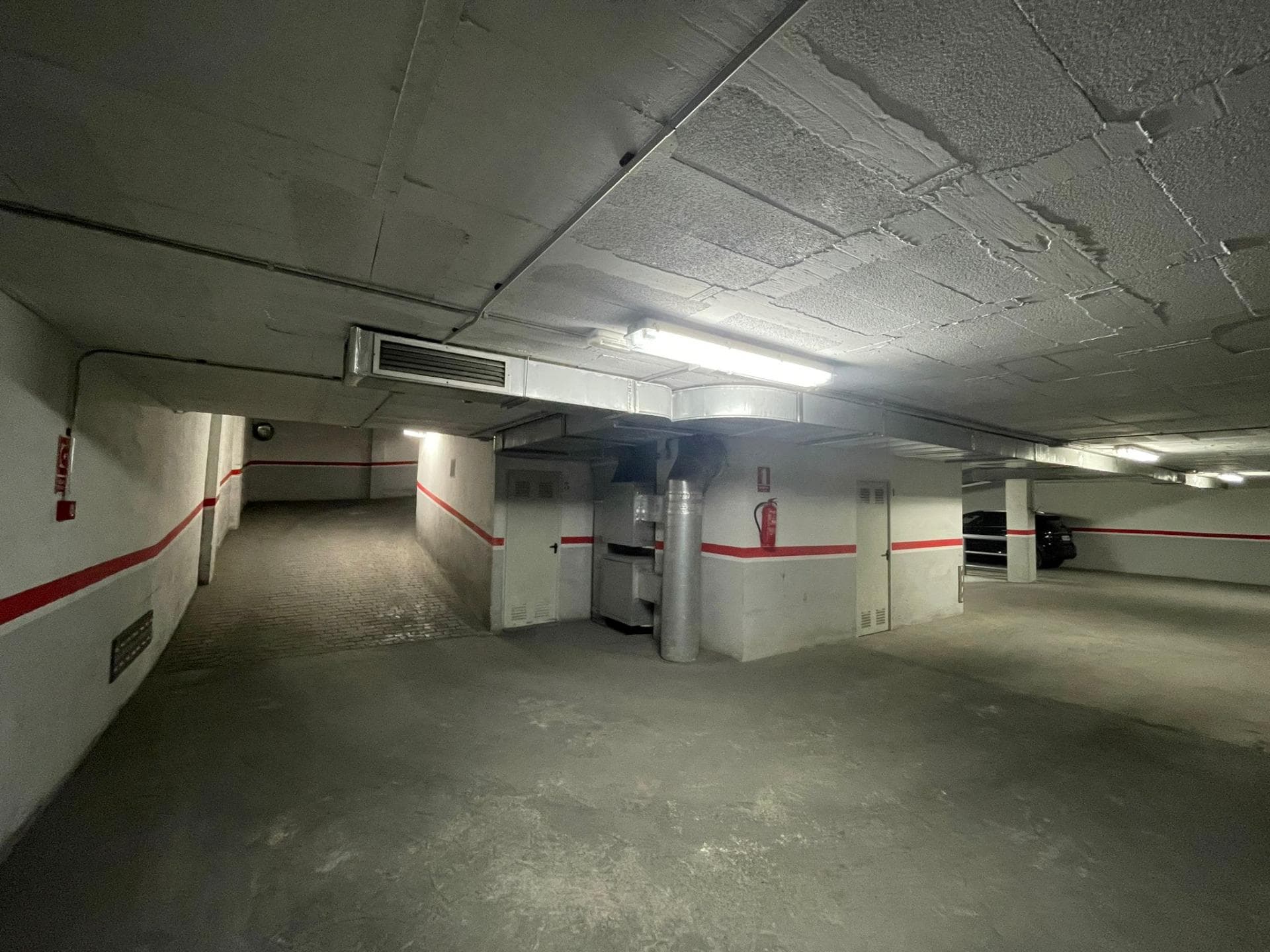 Parking space located on level -2, with comfortable access ramps.