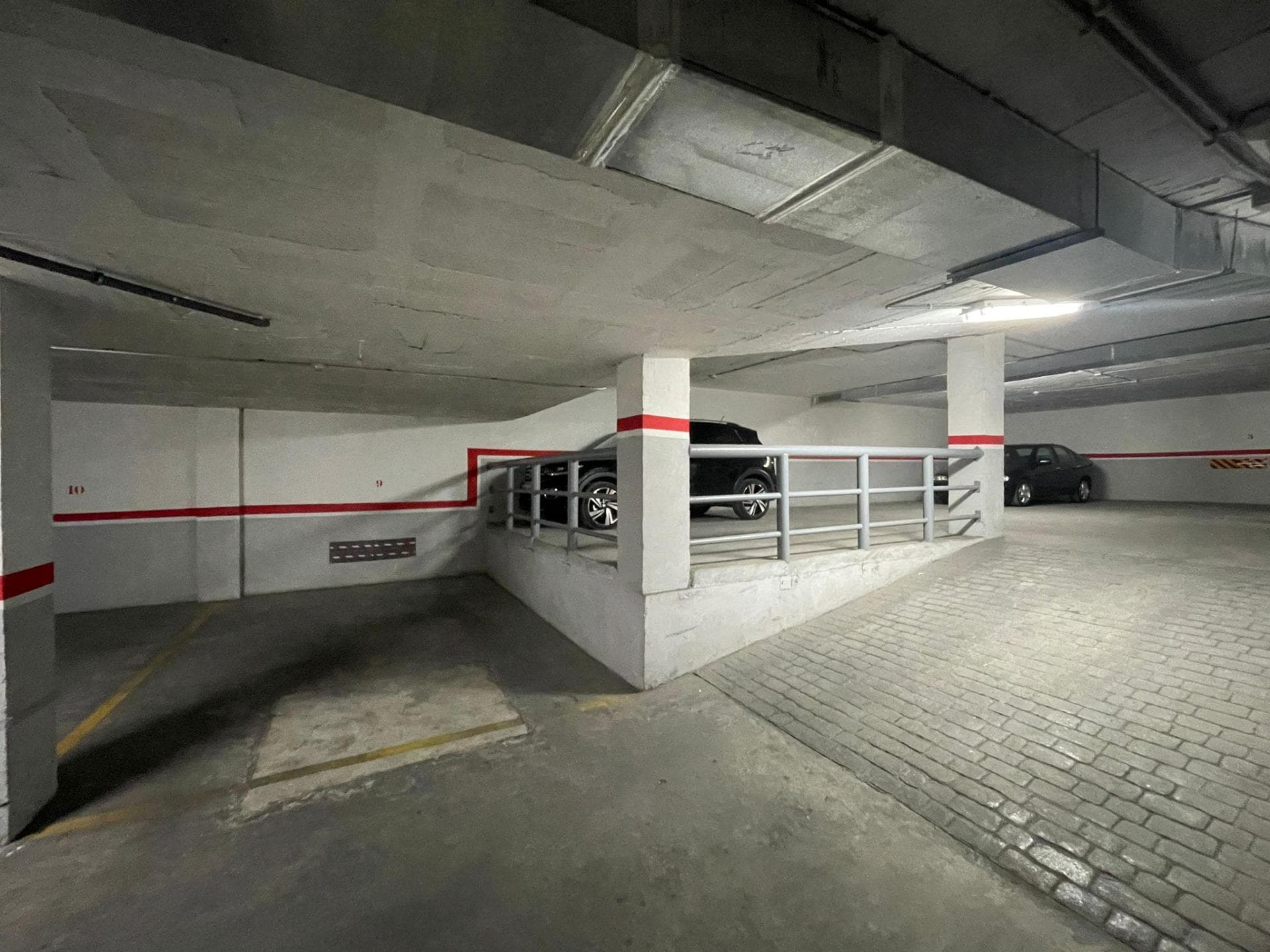 Parking space located on level -2, with comfortable access ramps.
